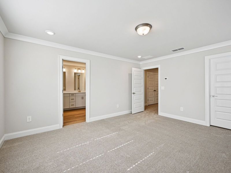 Spacious, unfurnished interior of a new home in Hemingway - Highland Series, Cumming (Image 13).