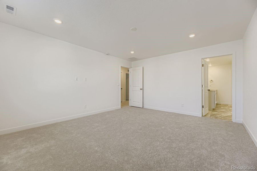 Spacious, unfurnished interior of a new home in Newlin Crossing: The Monarch Collection, Parker (Image 16). Spacious, unfurnished interior of a new home in Newlin Crossing: The Monarch Collection, Parker (Image 16).