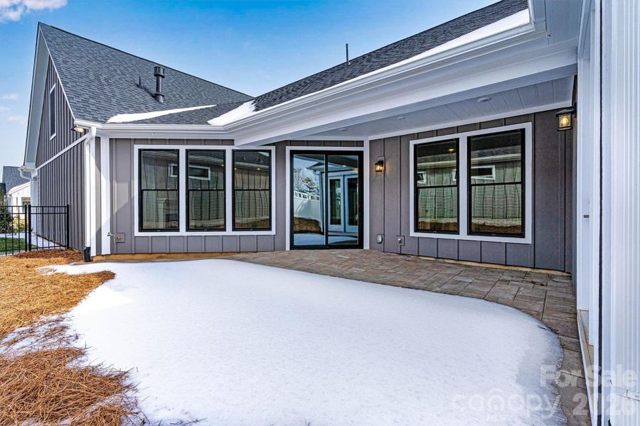 Exterior details and patio area of a home in The Courtyards at Lake Davidson, Mooresville (Image 3).