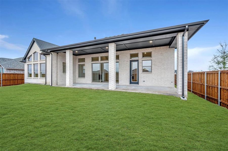 Exterior details and patio area of a home in Terraces – Estates, Rockwall (Image 19). Exterior details and patio area of a home in Terraces – Estates, Rockwall (Image 19).