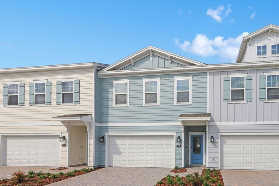 Exterior details and patio area of a home in Cherry Elm at SilverLeaf, St. Augustine (Image 19).