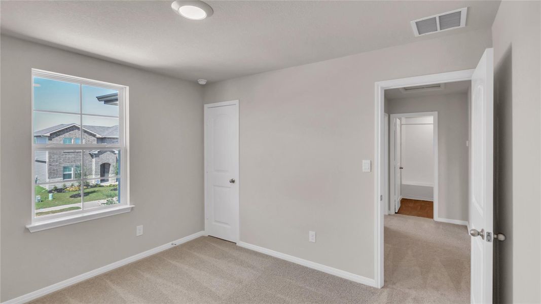 Spacious, unfurnished interior of a new home in Carillon, Manor (Image 28).