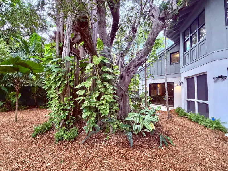 Exterior details and patio area of a home in , Miami (Image 1).