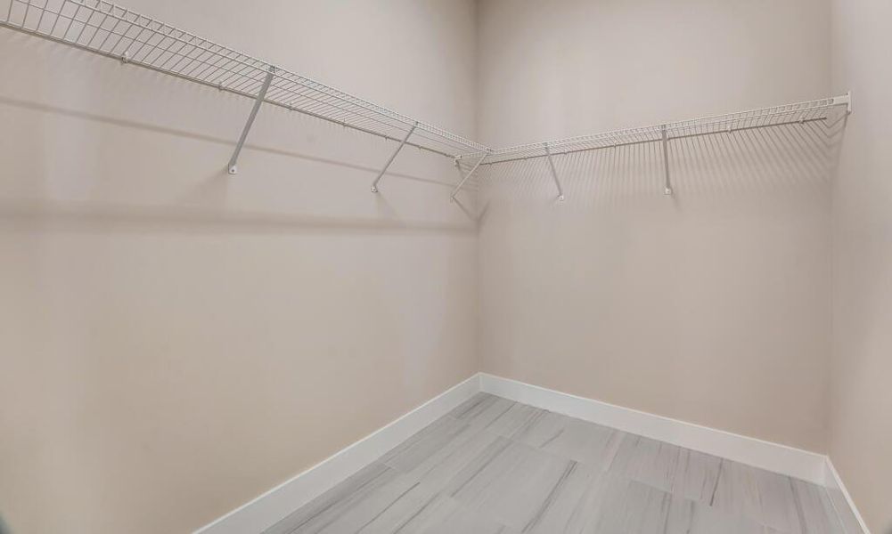 Furnished interior view inside a new home in Apex at Avenir, Palm Beach Gardens (Image 8). Furnished interior view inside a new home in Apex at Avenir, Palm Beach Gardens (Image 8).