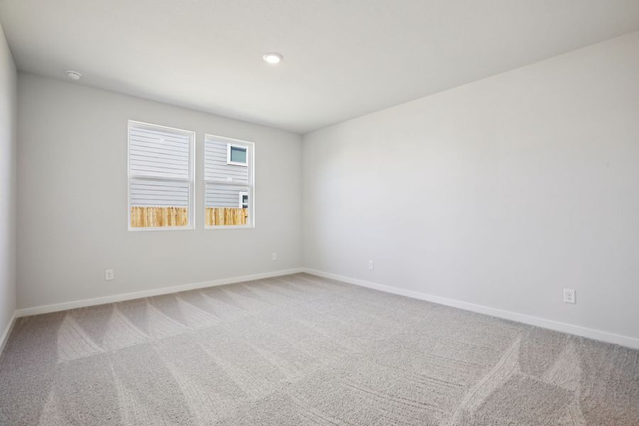 A room with a white wall and a white floor.