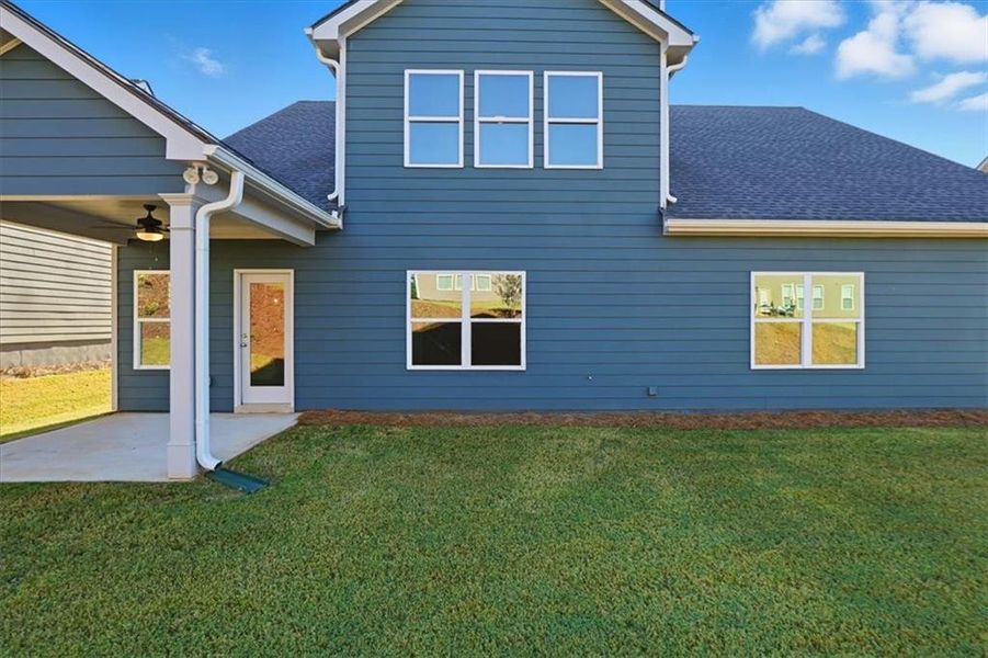 Exterior details and patio area of a home in Traditions of Braselton, Jefferson (Image 27).
