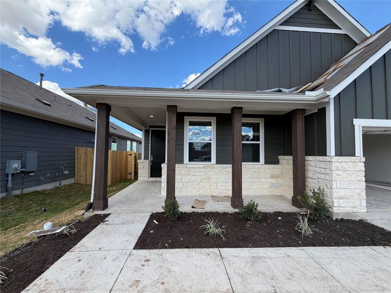 Exterior details and patio area of a home in Willow Springs, Buda (Image 3).
