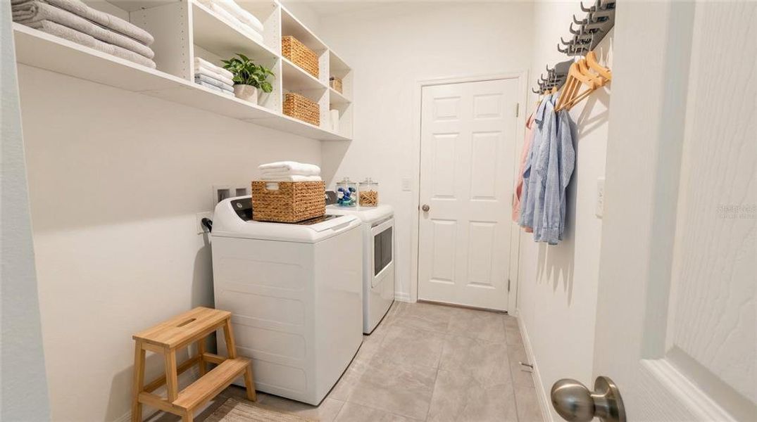 Furnished interior view inside a new home in Village at Windsor Reserve, Eagle Lake (Image 16).