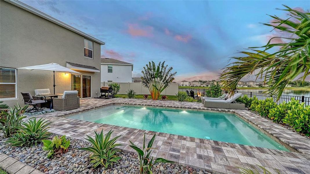 Exterior details and patio area of a home in Bella Lago, Parrish (Image 4).