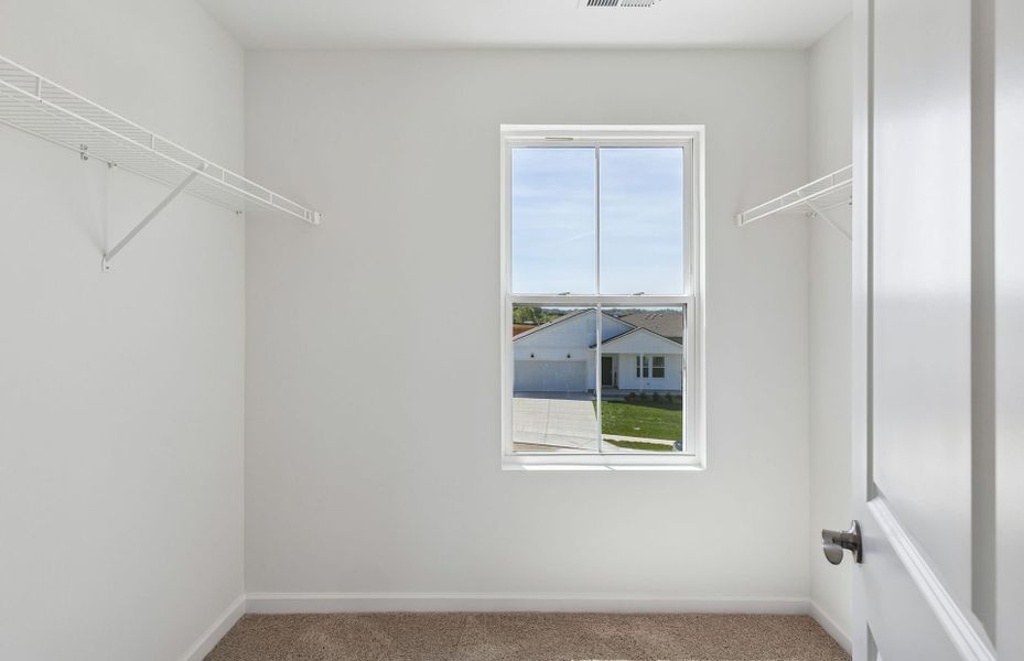 Spacious, unfurnished interior of a new home in Highlands of Carter's Station, Columbia (Image 21).