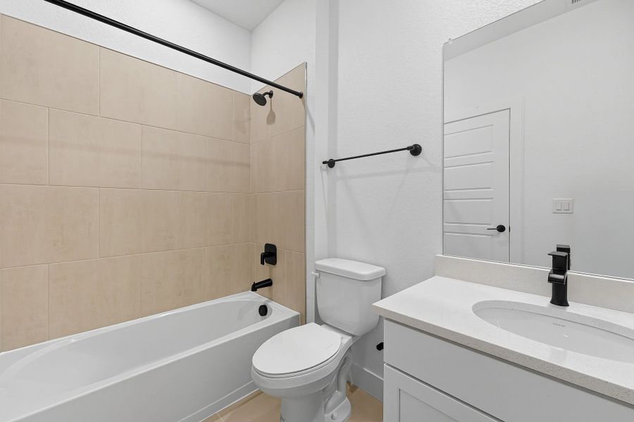Furnished interior view inside a new home in Trailstone, Arvada (Image 7).