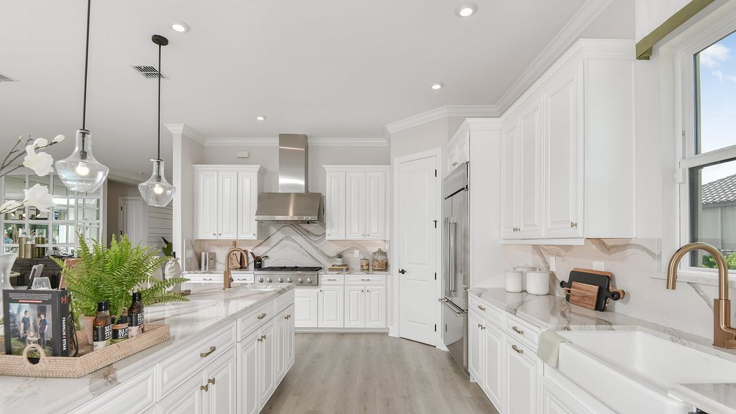Furnished interior view inside a new home in Esplanade at Tradition, Port St. Lucie (Image 9).