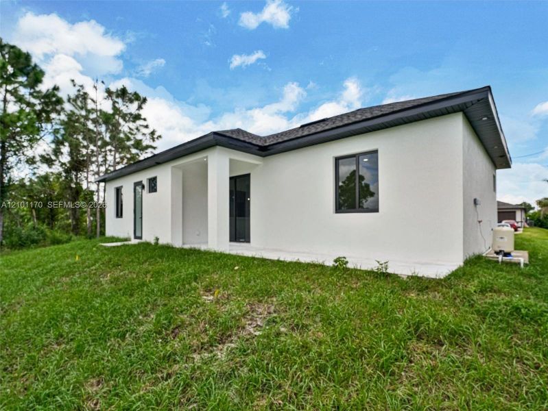 Exterior details and patio area of a home in , Lehigh Acres (Image 21). Exterior details and patio area of a home in , Lehigh Acres (Image 21).