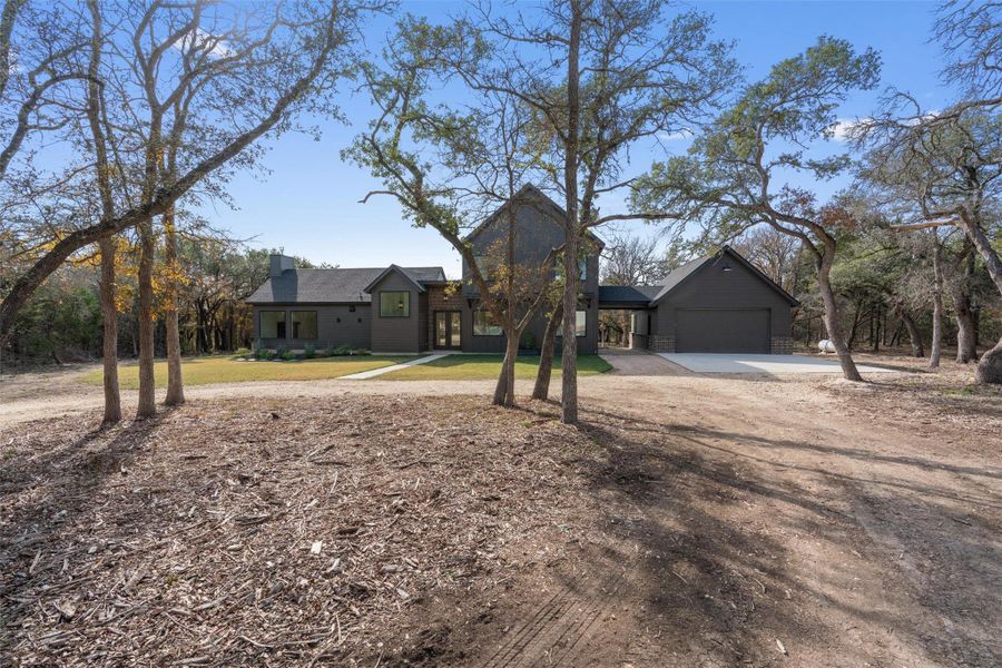 A quiet country approach to a home that feels private, peaceful, and perfectly placed. Welcome to 2851 CR 255. A quiet country approach to a home that feels private, peaceful, and perfectly placed. Welcome to 2851 CR 255.