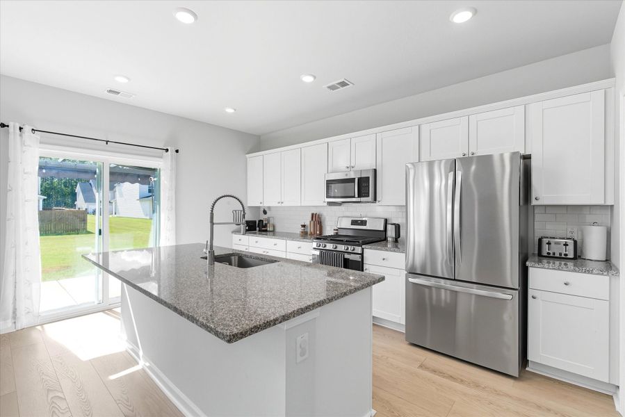 Furnished interior view inside a new home in Heron's Walk at Summers Corner: Carolina Collection, Summerville (Image 4). Furnished interior view inside a new home in Heron's Walk at Summers Corner: Carolina Collection, Summerville (Image 4).