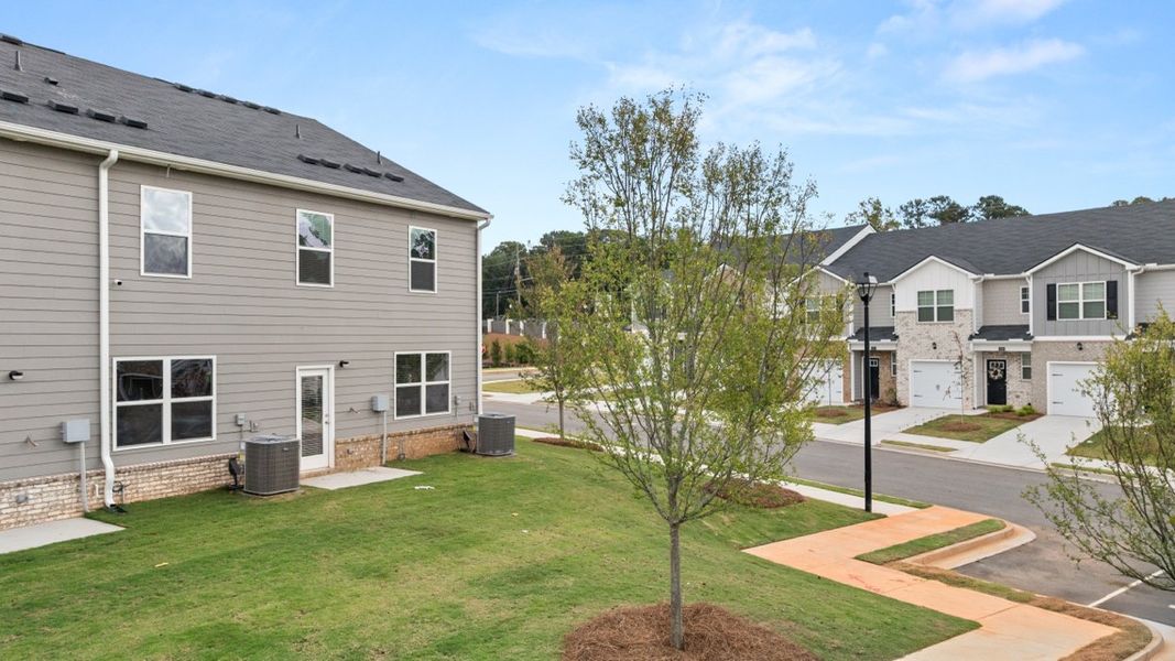 Exterior details and patio area of a home in Young's Crossing, Stone Mountain (Image 3).