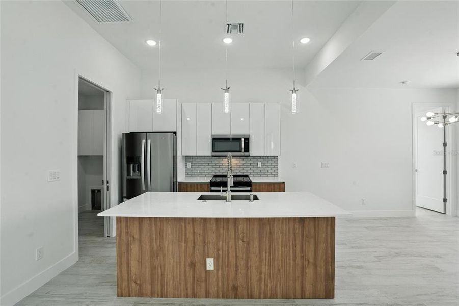 Furnished interior view inside a new home in , Port Charlotte (Image 12).