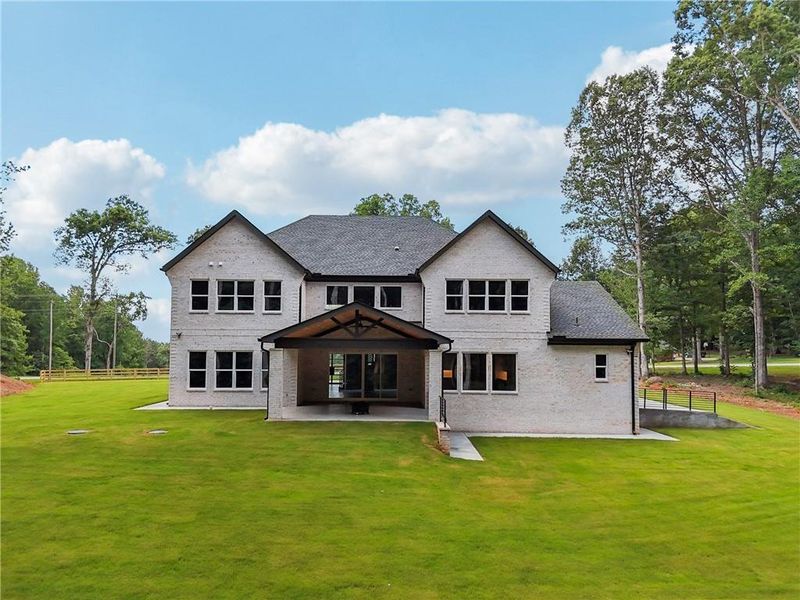 Front exterior of a new home in , Commerce, GA, highlighting curb appeal (Image 28).