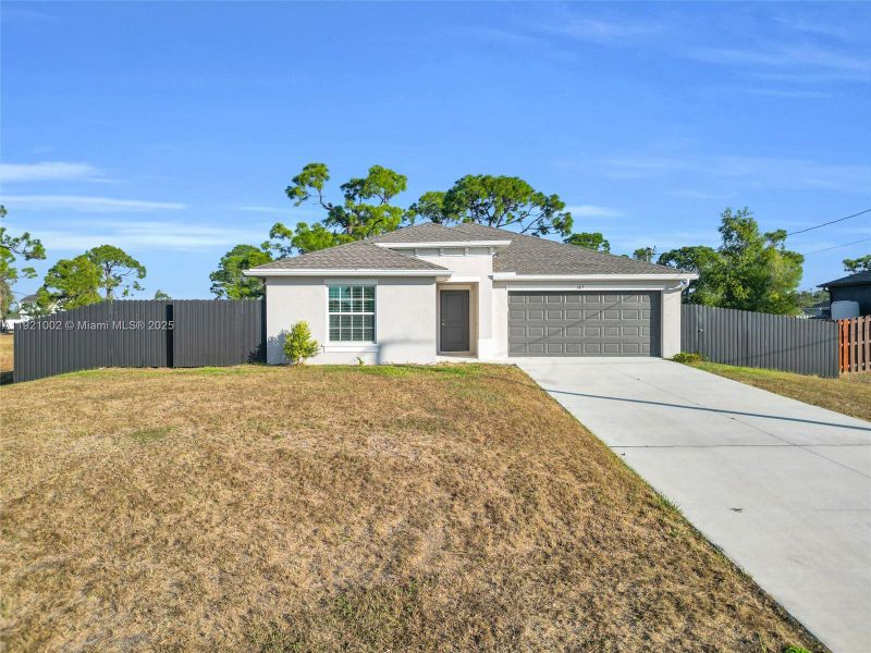 Front exterior of a new home in , Cape Coral, FL, highlighting curb appeal (Image 20). Front exterior of a new home in , Cape Coral, FL, highlighting curb appeal (Image 20).