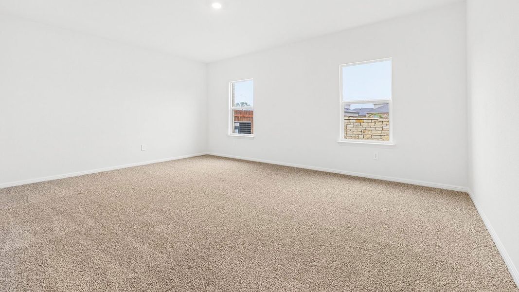 Spacious, unfurnished interior of a new home in Bar W Ranch, Leander (Image 25).