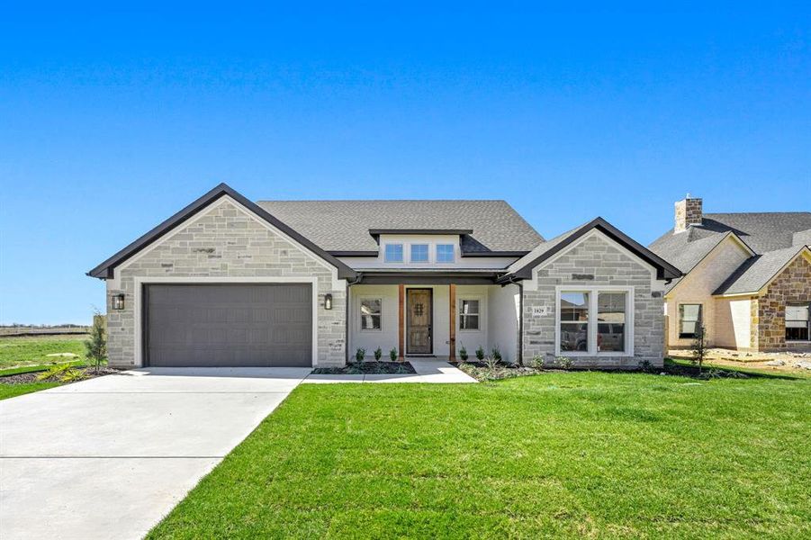 Front exterior of a new home in , Cleburne, TX, highlighting curb appeal (Image 25).
