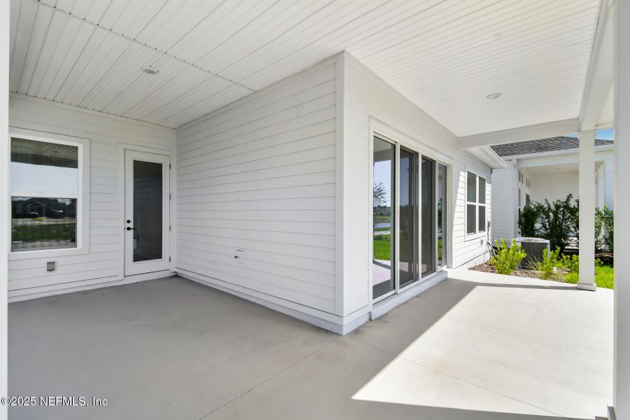 Exterior details and patio area of a home in Seven Pines 50' Front Entry, Jacksonville (Image 2).