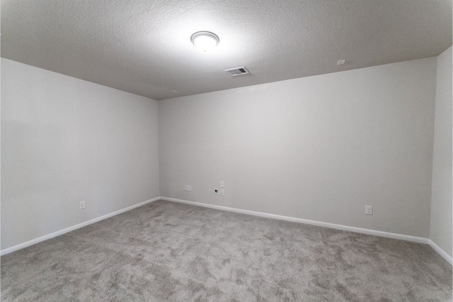 Spacious, unfurnished interior of a new home in Canterra Creek, Rosharon (Image 39).