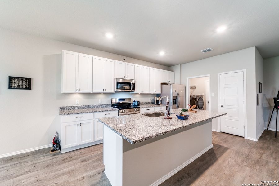 Furnished interior view inside a new home in Legend Pond, New Braunfels (Image 15).