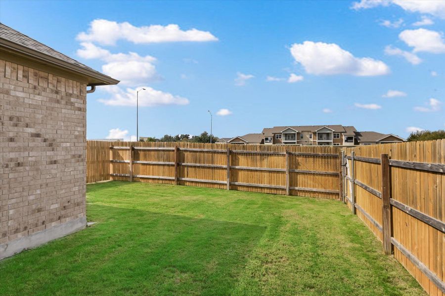 Exterior details and patio area of a home in Sonoma Heights, Round Rock (Image 3). Exterior details and patio area of a home in Sonoma Heights, Round Rock (Image 3).