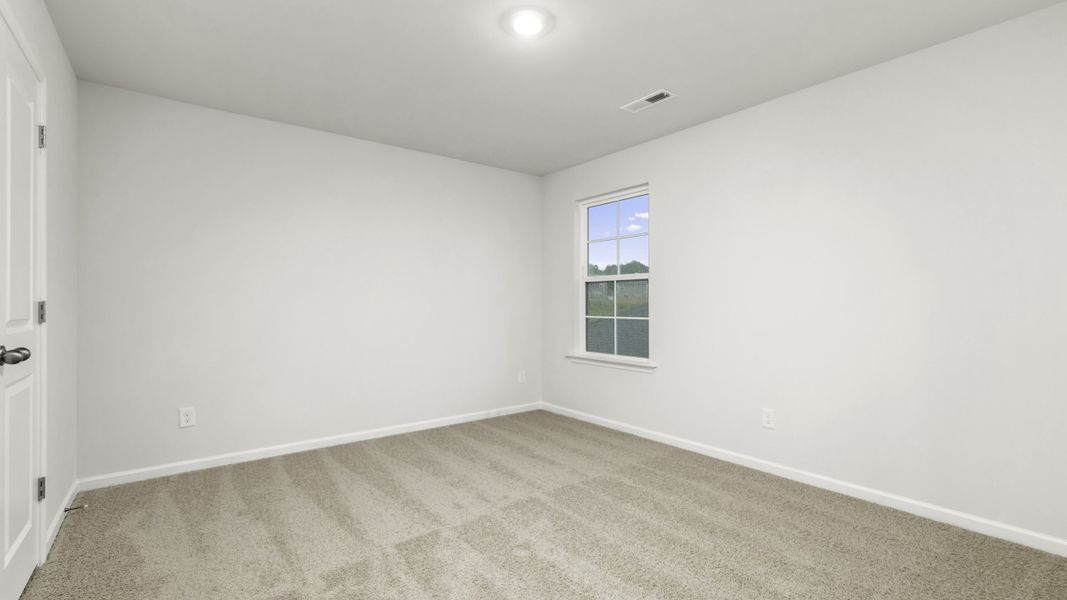 Representative unfurnished interior of a home built from the Manning by D.R. Horton in Chandler Pointe, Rural Hall (Image 20).