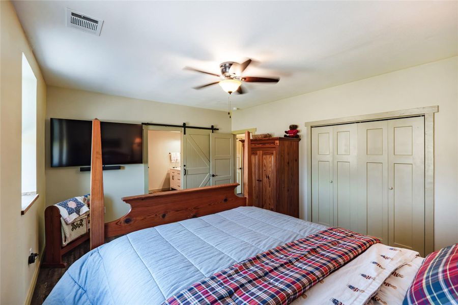 Guest bedroom enjoys LVP flooring and ensuite bathroom Guest bedroom enjoys LVP flooring and ensuite bathroom