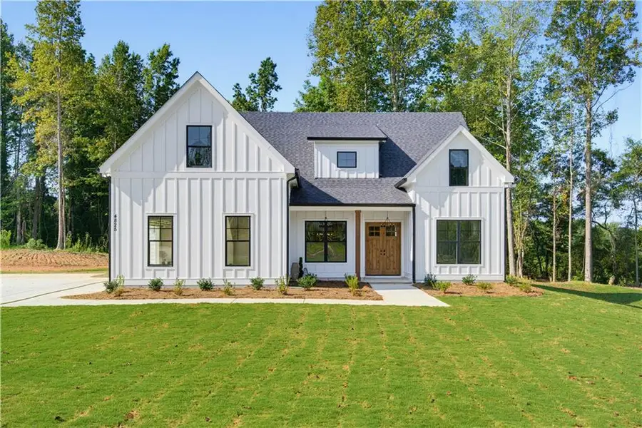 Front exterior of a new home in , Gainesville, GA, highlighting curb appeal (Image 2). Front exterior of a new home in , Gainesville, GA, highlighting curb appeal (Image 2).
