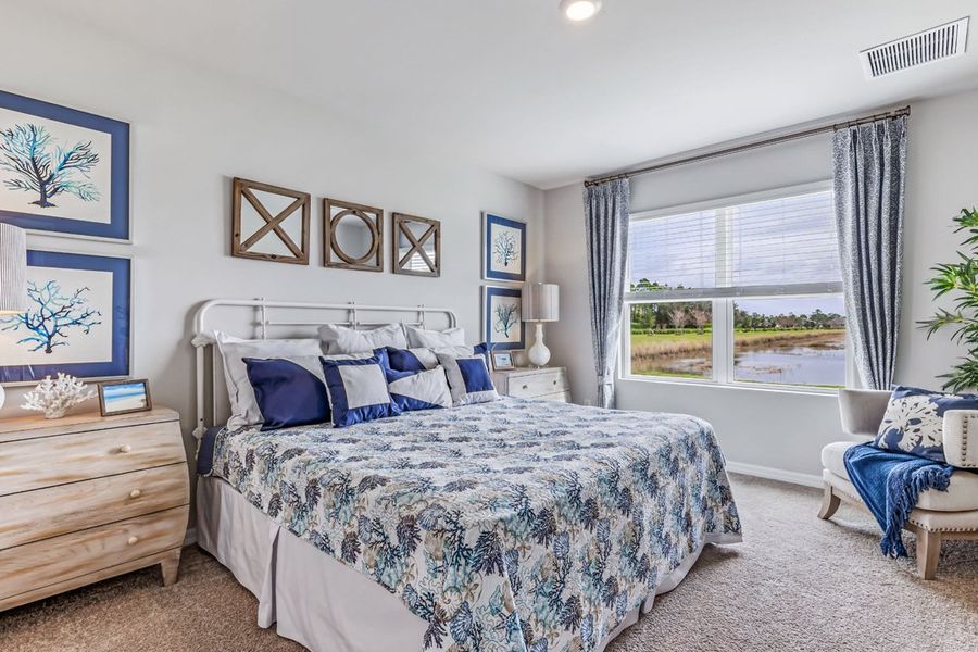 Representative furnished interior of a home built from the Cali by D.R. Horton in Magnolia Landing Express, North Fort Myers (Image 12).