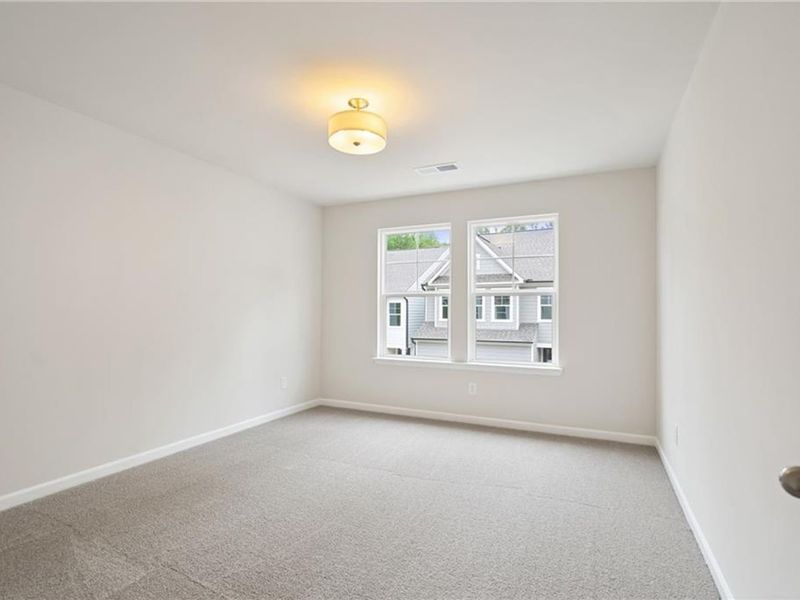 Spacious, unfurnished interior of a new home in The Village at Shallowford, Kennesaw (Image 27).