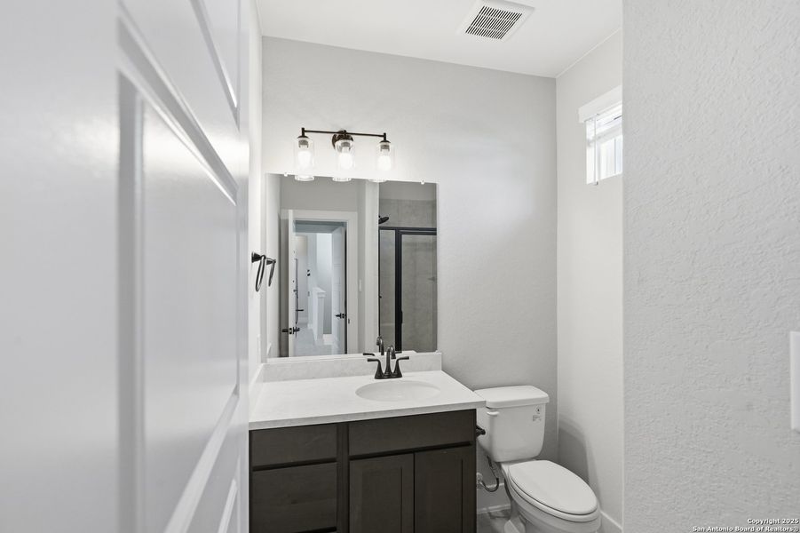 Furnished interior view inside a new home in Esperanza – New Phase Now Selling, Boerne (Image 11).