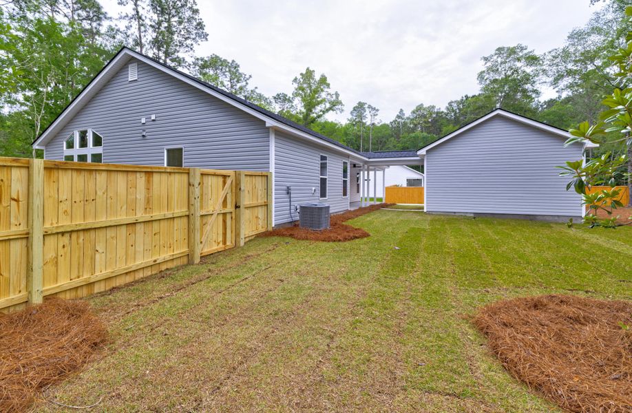 Front exterior of a new home in , Lincolnville, SC, highlighting curb appeal (Image 26). Front exterior of a new home in , Lincolnville, SC, highlighting curb appeal (Image 26).