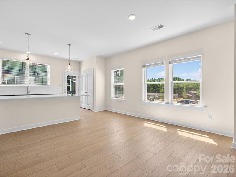 Spacious, unfurnished interior of a new home in Central Living at Craig, Charlotte (Image 19).