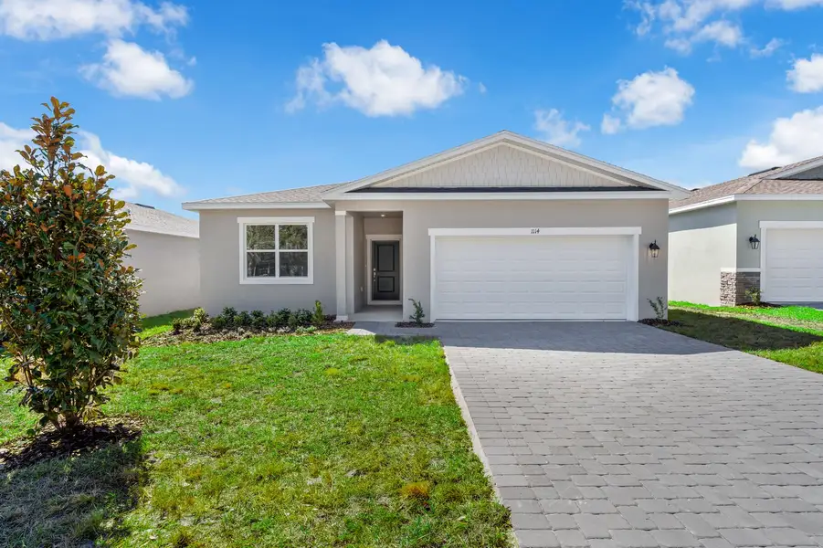 Representative exterior photo of a completed home built from the Seaton II by Stanley Martin Homes in Sorrento Pines, Sorrento, FL (Image 20). Representative exterior photo of a completed home built from the Seaton II by Stanley Martin Homes in Sorrento Pines, Sorrento, FL (Image 20).