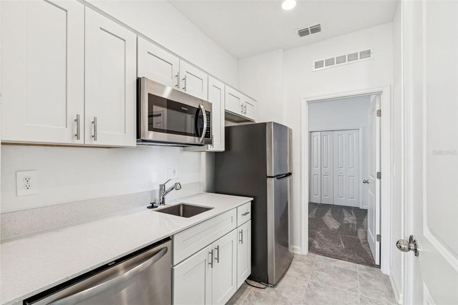 Furnished interior view inside a new home in Ranches at Lake McLeod, Eagle Lake (Image 9).