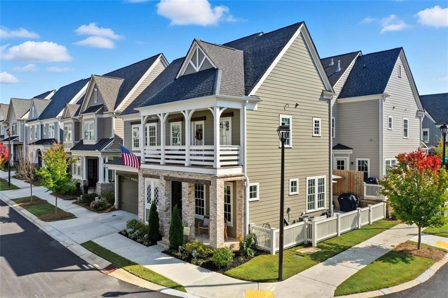 Front exterior of a new home in , Woodstock, GA, highlighting curb appeal (Image 21).