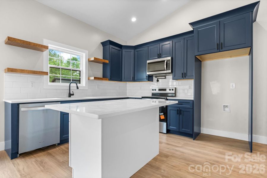 Furnished interior view inside a new home in , Lenoir (Image 10).