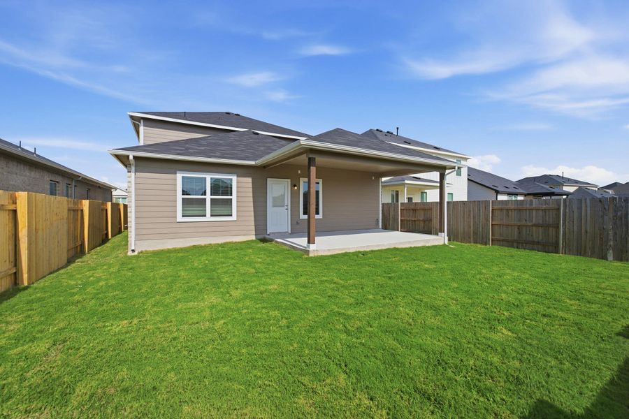 Exterior details and patio area of a home in Sunfield, Buda (Image 24).