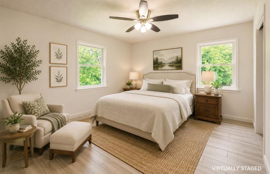 Bedroom featuring light wood-finish flooring, recessed lighting, and a ceiling fan