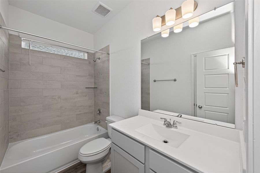 Furnished interior view inside a new home in Enclave at Willis, Willis (Image 10).