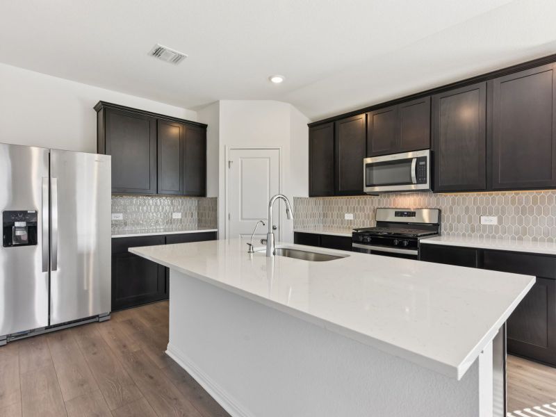 Furnished interior view inside a new home in Prairie Winds - Boulevard Collection, Hutto (Image 3).