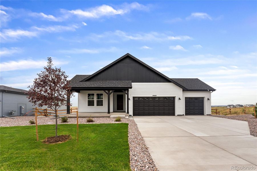 Front exterior of a new home in Independence, Elizabeth, CO, highlighting curb appeal (Image 24). Front exterior of a new home in Independence, Elizabeth, CO, highlighting curb appeal (Image 24).