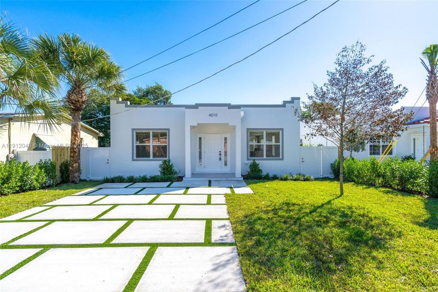 Front exterior of a new home in , West Palm Beach, FL, highlighting curb appeal (Image 20).