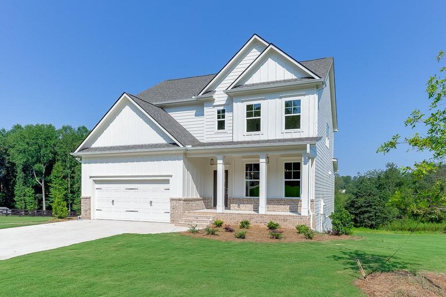 Front exterior of a new home in , Jefferson, GA, highlighting curb appeal (Image 22).