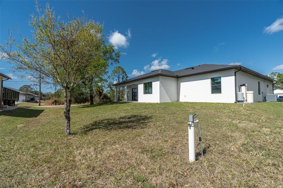 Exterior details and patio area of a home in , North Port (Image 25).