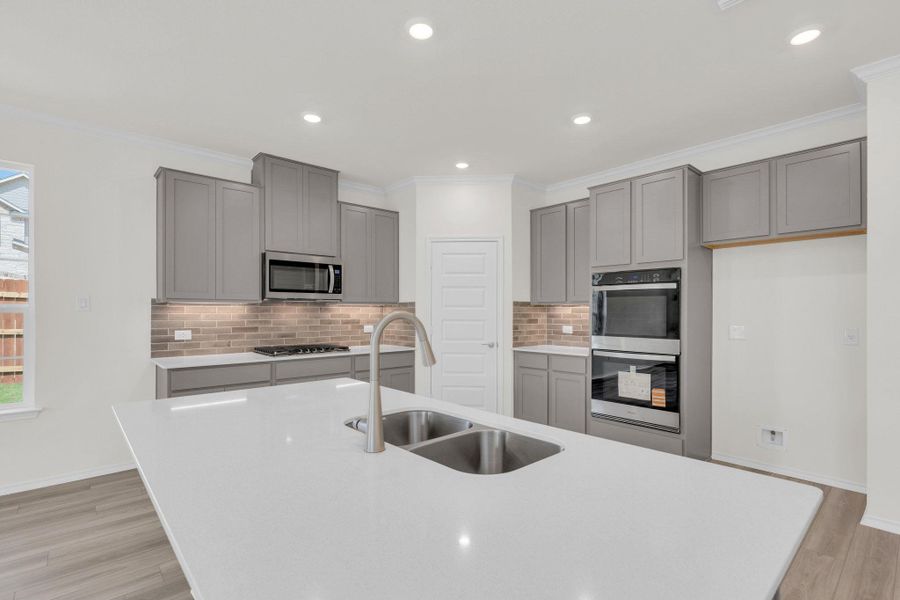 Furnished interior view inside a new home in Salerno - Classic Collection, Round Rock (Image 7). Furnished interior view inside a new home in Salerno - Classic Collection, Round Rock (Image 7).